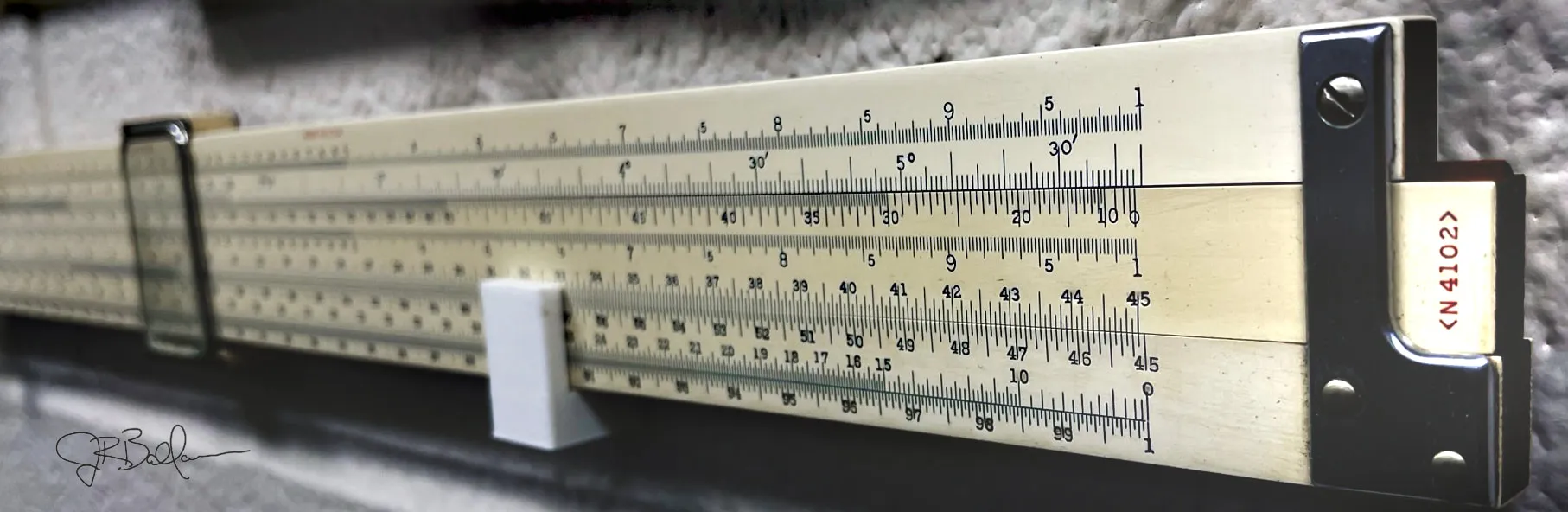 The author's N4102 Surveyor's Duplex, displayed on a classroom wall