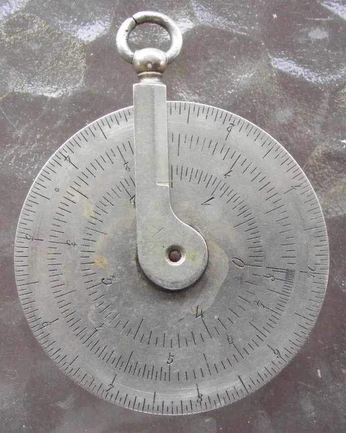 Charpentier Calculator rear side, showing the log scale, tangent scale, and sine scale