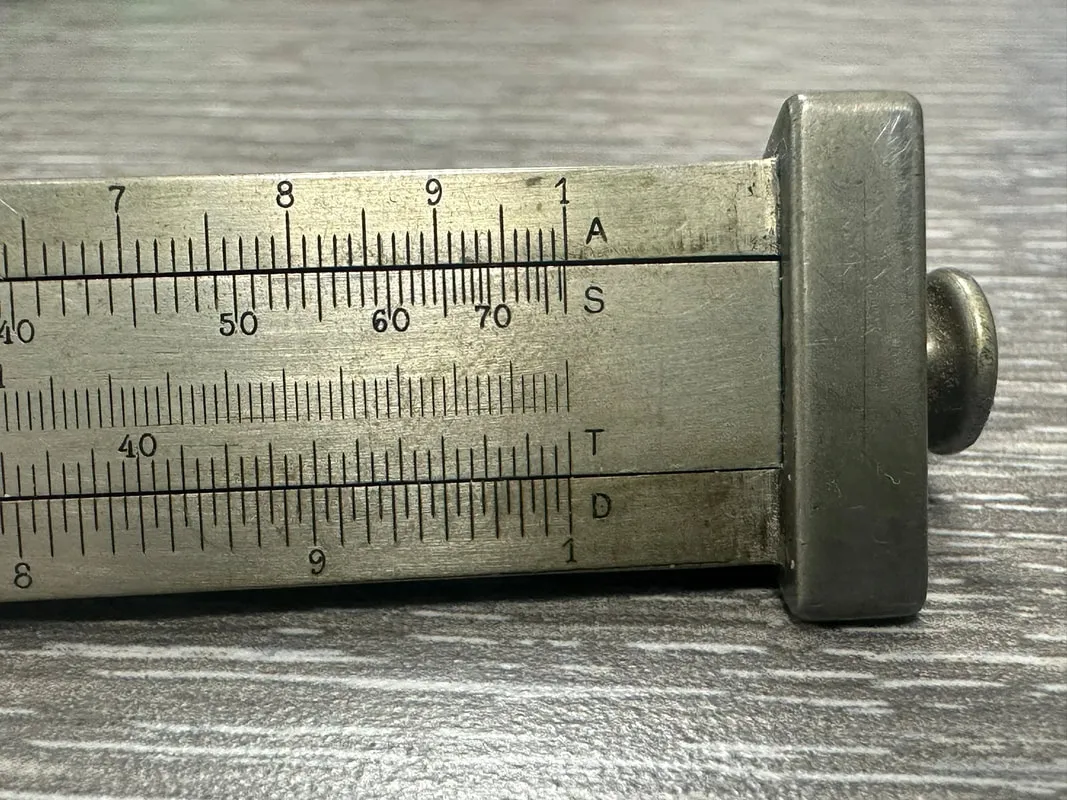 Side 3 of the Model 4095 Triangular Metal Rule, showing the A, S, T, D scale labels