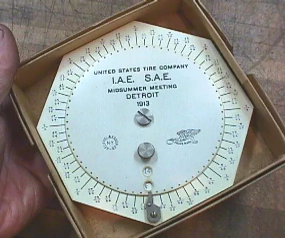 The K&E Model 4180 Fraction Adder, a circular slide rule with fractional scales in 64ths, privately branded for the United States Tire Company