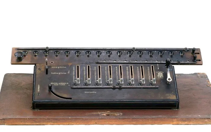 The K&E Reckoning Machine, a Peerless-brand stepped-drum calculating machine made in Germany and marked 'Keuffel & Esser Co, New York' on the front
