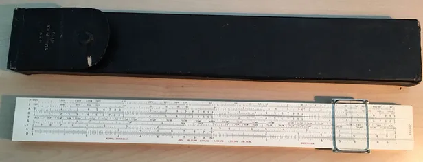 An eBay listing photo of the Model 4110 Power Trig rule with its original box