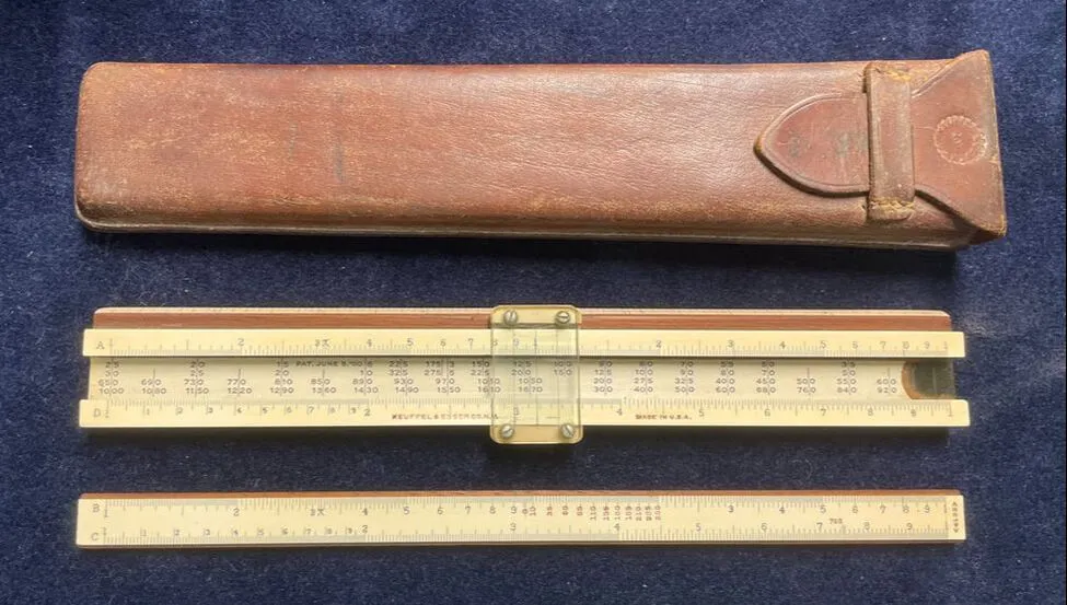 The K&E Model 4133 Roylance electrical slide rule, front side with leather case