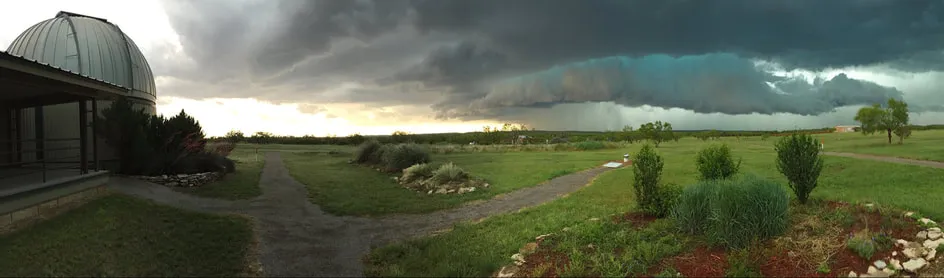 A panoramic weather view over an observing site