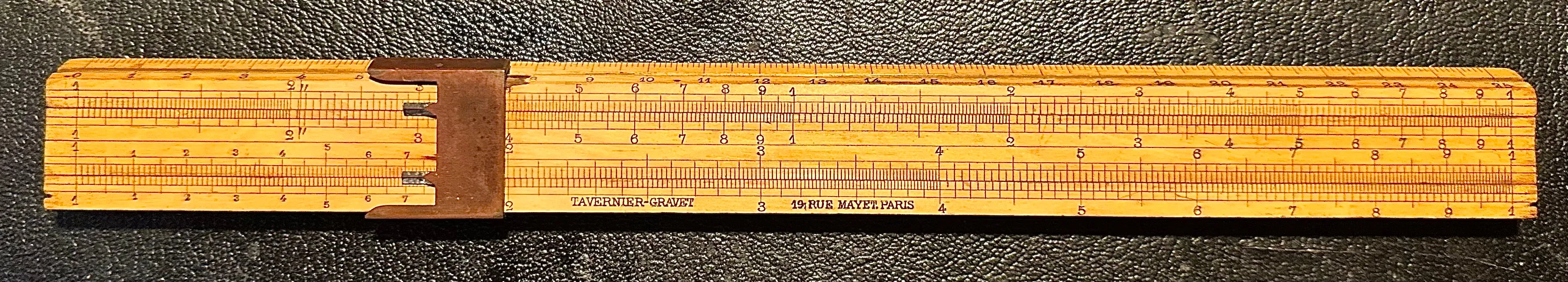 A Tavernier-Gravet Mannheim slide rule with brass chisel indicator