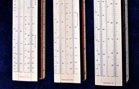 A collection of N4053 Polyphase Mannheim rules in 8, 10, and 20 inch lengths
