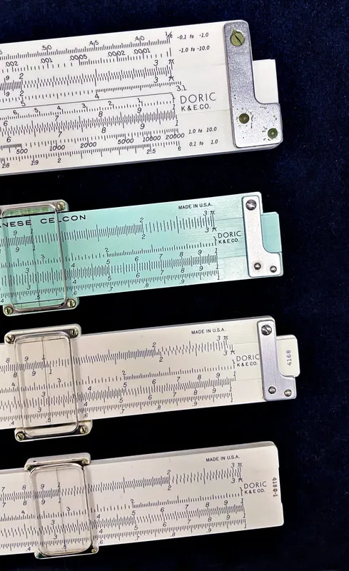 Four Doric family slide rules from the collection, top to bottom: N9081-3, 4168 Celanese Celcon, 4168 Polyphase Duplex, and the 4150-1 Merchant’s Pocket Rule