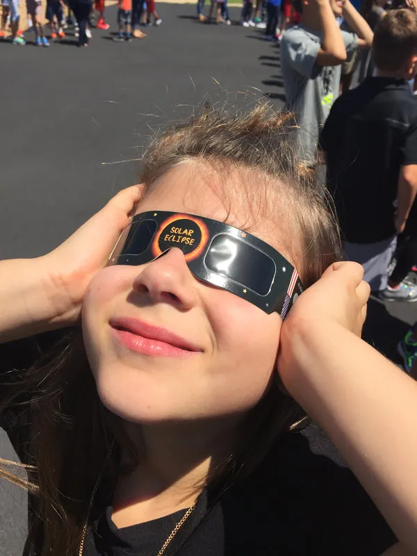Eclipse glasses in use