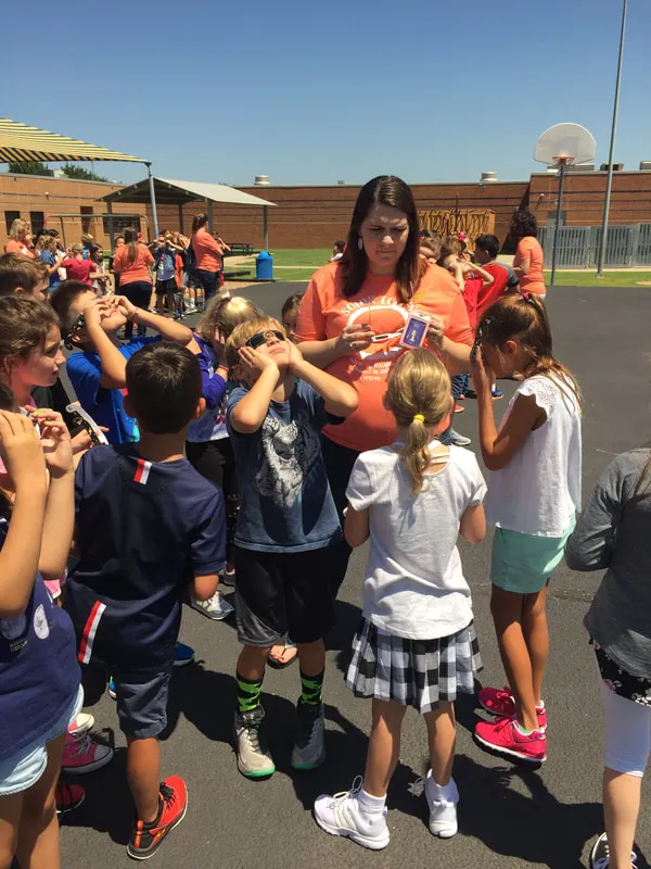 Eclipse glasses in use