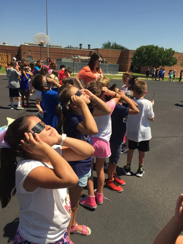 Eclipse glasses in use