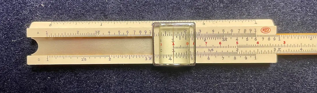 A Post/Hemmi 1441 slide rule set to compute log(4.1)
