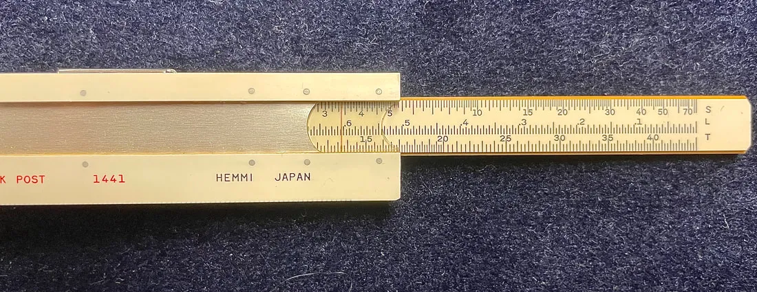 The back of the Post/Hemmi 1441 slide rule, showing the L scale
