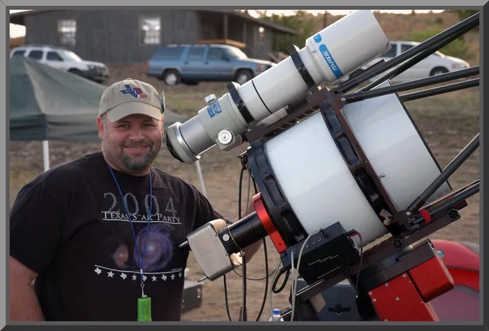 Jay Ballauer with his telescope